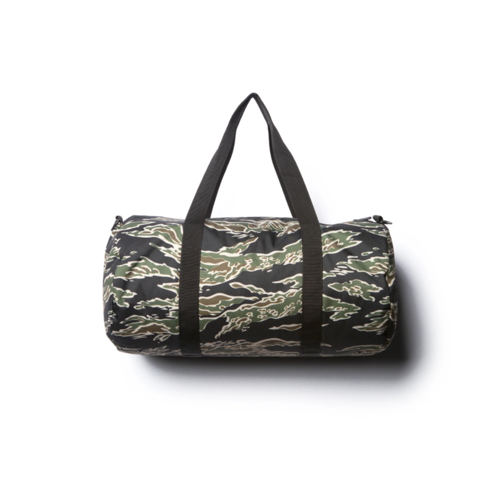 Camouflage duffel bag with black straps on a white background